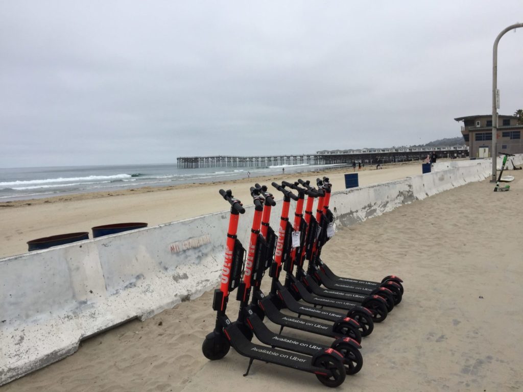 Bird And Lime Scooters On The BoardWalk Electric Scooter Rental