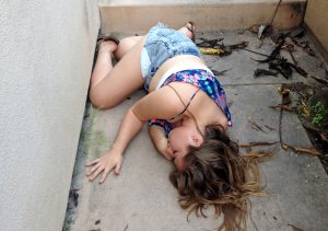 Photo posted on NextDoor.com of a passed out girl 
